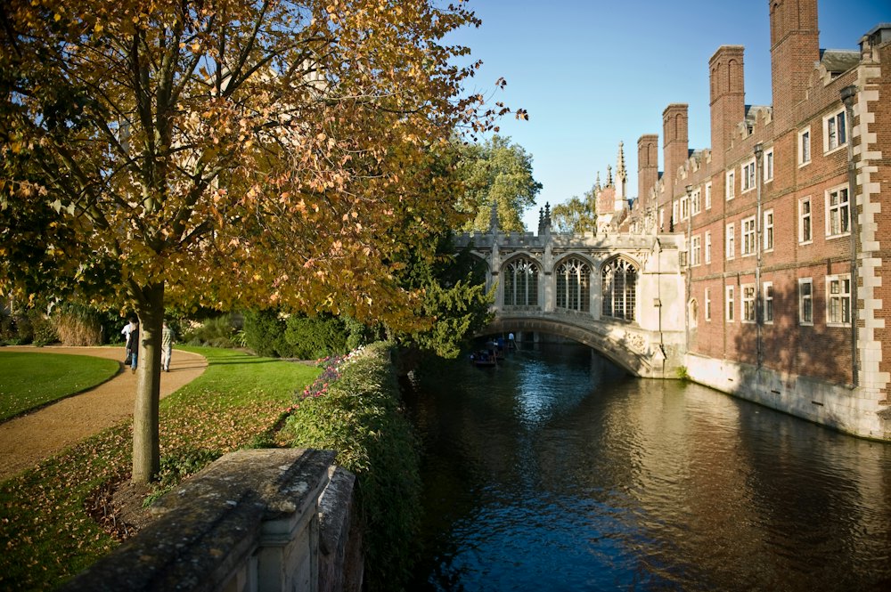 College building beside the river in Cambridge